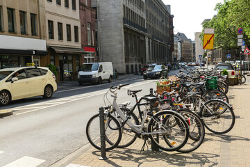 Modern bicycles parked on city street