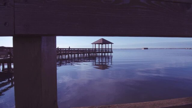 Wooden gazebo surrounded by lagoon water