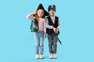 Fototapeta premium Cute little pirates with lantern and sword on blue background