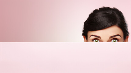 text space for advertising with funny part as portrait of a black haired female model peeking over a colored panal