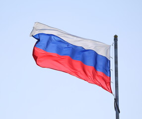The flag of the Russian Federation is waving in the wind