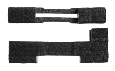 Black foamy styrofoam for packaging wrapping material, lap top, isolated on white, clipping path