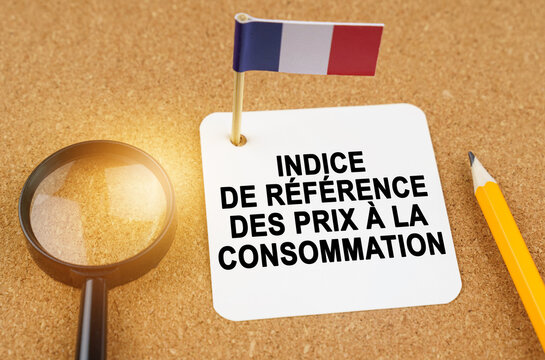 On the table is the flag of France and a sheet of paper with the inscription - core consumer price index