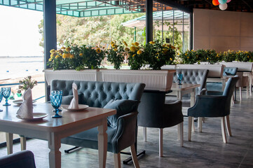Fototapeta na wymiar Interior in cafe, restaurant. Cozy decor