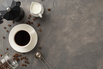 Barista's Haven: Roasted coffee beans, espresso cup on saucer, milk jar, measuring spoon, and kettle displayed on stylish dark grunge background