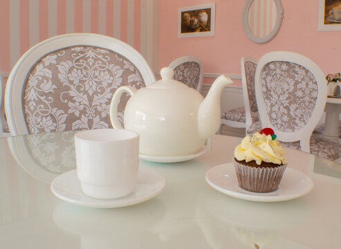 cupcake con una taza de té con estilo vintage  