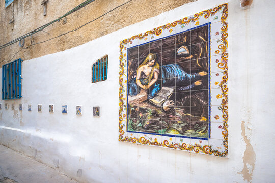 MAZARA DEL VALLO, ITALY - JULY 8, 2023: Street art in The city centre, known as the Kasbah with Arab architecture elements.