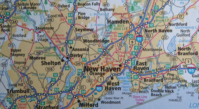 Close up view of a map of the New Haven, Connecticut area on a road atlas