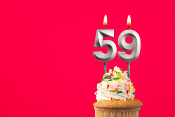 Burning candle number 59 - Birthday card with cake