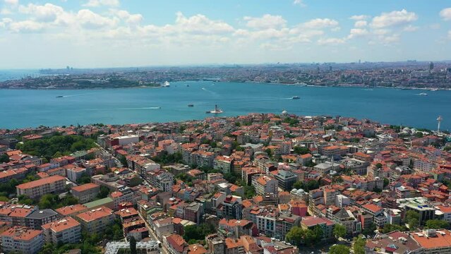 Uskudar one of the oldest districts of Istanbul and aerial images of the Bosphorus, bridges business centers and the historical peninsula