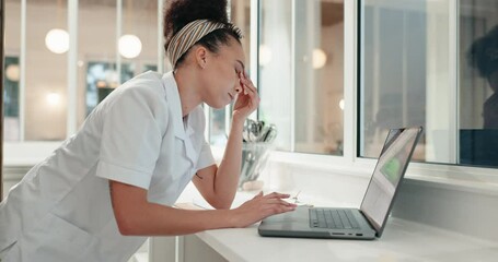 Headache, woman and laptop in kitchen with burnout and stress in restaurant from streaming cooking idea online. Chef, anxiety and person in pain on computer of reading nutrition info on website