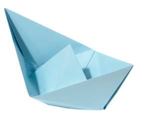 Blue paper boat on a white isolated background