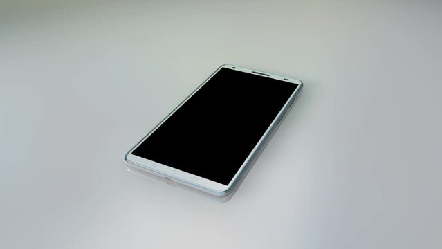 Modern white touchscreen android cellphone tablet smartphone isolated on light
