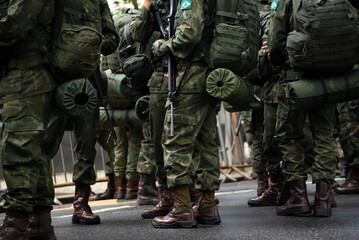 Army soldiers await the start of the Brazilian independence parade in the city of Salvador, Bahia.