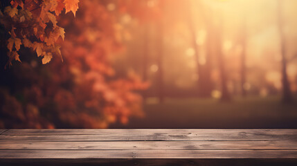 Naklejka na ściany i meble Wooden table in front of blurred autumn background