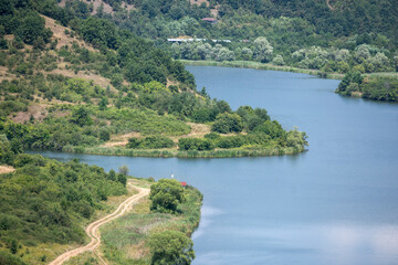 Fototapeta premium Summer view of Pchelina Reservoir, Bulgaria
