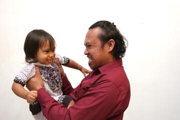 adorable son boy and young father have fun, enjoying time together, isolated on white