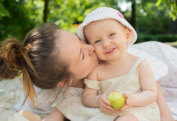 portrait of a cute baby in the garden