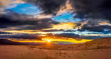 panorama sunset in the desert, sun, clouds, sky, sand
