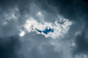 Sneak Peek of Bight Blue Sky On Cloudy Day