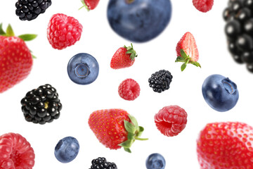 Many different berries flying on white background