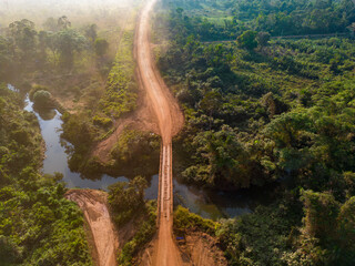 Drone shot of the famous earth road Transamazonica towards Santarém in dry season through the...