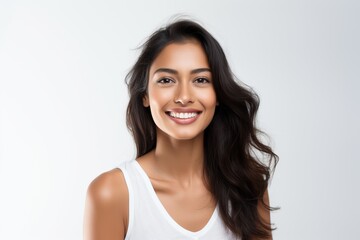 Closeup portrait of beautiful Asian Indian woman smiling with clean teeth. Used for dental advertising Isolated on white background.
