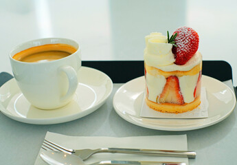 Hot coffee with delicious creamy cake