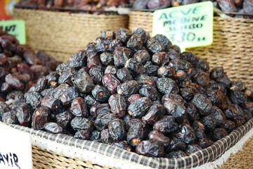  many date fruits display for sale at local market 