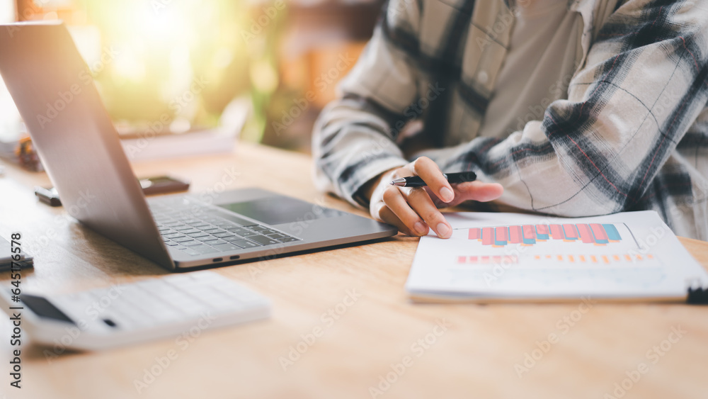 Leinwandbilder statistical analyst using calculator calculate and read reports graphs and charts, business statistics ,manage financial and marketing documents ,business growth graph ,Statistics and Data Concepts