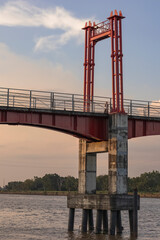 Kumala Island Red Bridge which is access to one of the tourist destinations in Tenggarong City, Kutai Kartanegara Regency, namely Kumala Island.