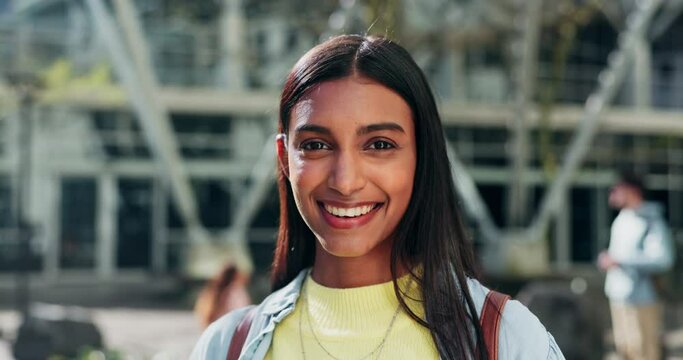 Face, woman and student smile at college for education, learning and knowledge at campus building. Portrait of young gen z indian girl studying at academy, university and pride for scholarship degree