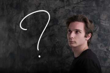 Man contemplates question, symbolizing pivotal life choices