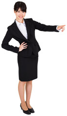 Digital png photo of smiling asian businesswoman pointing on transparent background