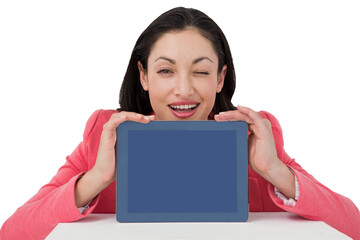 Digital png photo of happy winking caucasian businesswoman with tablet on transparent background