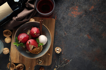 Tasty and delicious food concept - pear in wine