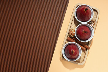 Tasty and delicious food concept - pear in wine