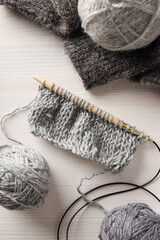 Cold season cozy hobby, concept of hobby - knitting