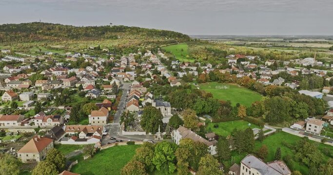 Kutna Hora Czechia Aerial v2 birds eye view fly around Sedlec Ossuary the cemetery church of all saints, tilt up reveals oldest Cistercian cathedral in Bohemia - Shot with Mavic 3 Cine - November 2022