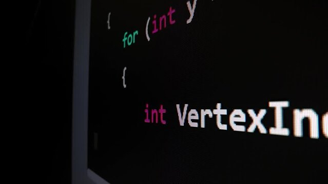 Closeup macro shot movement of coding script moving across LED screen with real-time AI-generated typing, showcasing advanced AI learning in optimization, debug and coding for software development.