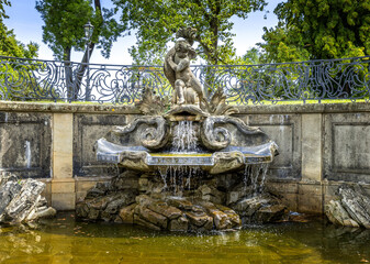 Fototapeta na wymiar The dolphin fountain on the Bruehl terraces in Dresden, Saxony