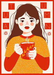 autumn girl holding a cup of cocoa in cosy sweater