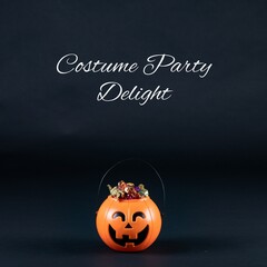 Composite of costume party delight text and halloween carved pumpkin on dark background