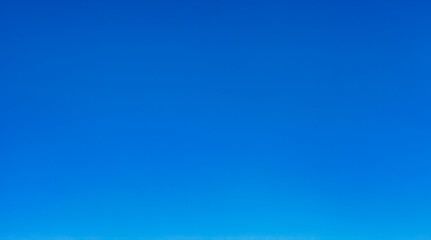 Photography of clear blue sky, atmospheric daytime background, banner. Panorama of clean blue sky...