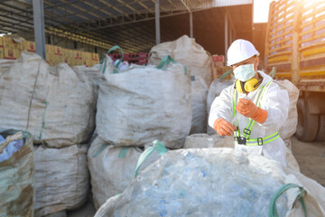 Manufacturers Engineer and tablet working at plastic bag manufacturers.