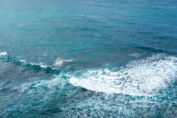 aerial view of waves rolling on the shoreline, blue sea waves, waves crashing on the sea, waves on the sea, waves on the beach, ocean sea water white wave splashing, kuta lombok