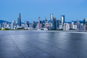 City square and skyline with modern buildings in Shenzhen, Guangdong Province, China.