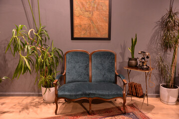 Sofa with nature aand frame on hanging wall