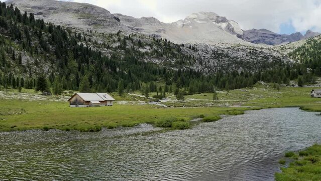 Le Vert Lake near the Lavarella Hut in the Greenery of the Fanes - Sennes - Braies Nature Park, Alpi Mountains, Italy