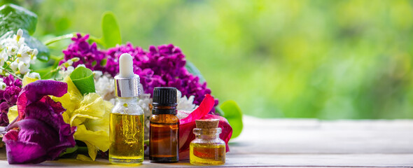 Essential oil extract of herbs and flowers. Selective focus